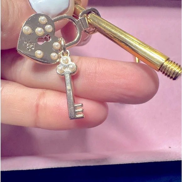 CHANEL heart and lock authentic charm on gold plated bracelet